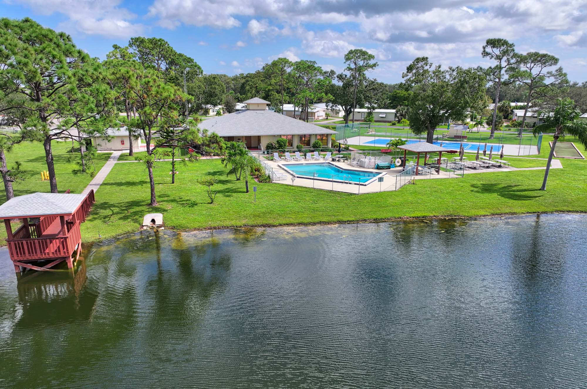 Aerial view of a lake in the Country Lakes community